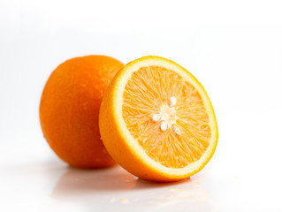 Half slide of fresh nature ripe orange on white background