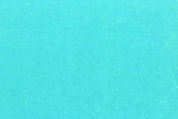 Texture of old parchment crumpled stained turquoise paper carboard for background 