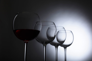Glasses of red wine.