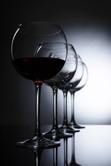 Glasses of red wine.