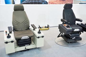 Seats for construction machinery