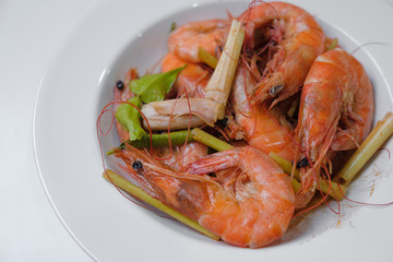 Baked Shrimp on a plate on white background