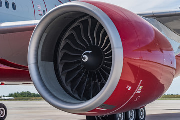 Close up engine of red Boeing 777