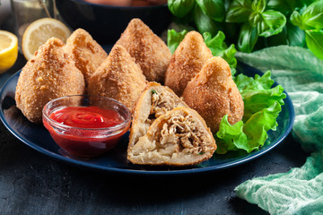 Coxinha. Fried croquette with chicken