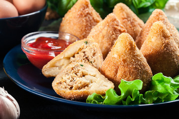 Coxinha. Fried croquette with chicken