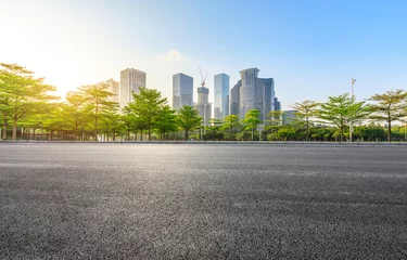 Foto op Canvas Empty asphalt road and modern city commercial buildings at sunrise in Shenzhen © ABCDstock