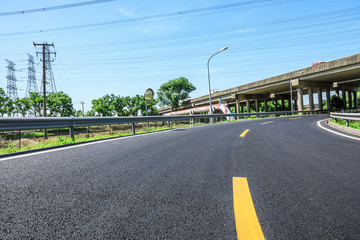 Fototapeta premium Empty asphalt highway and bridge building