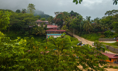 Beautiful view of Kuala Tahan, a Malaysian village located at the confluence of the Tahan and Tembeling Rivers and gateway to Taman Negara National Park in the state of Pahang.