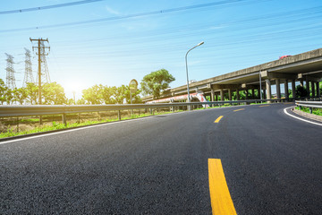 Empty asphalt highway and bridge building