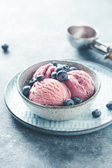 Blackberry ice cream in a blue bowl