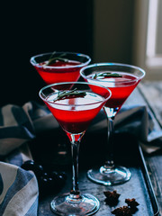 Red currant jelly in a glass. Drink in martini glass