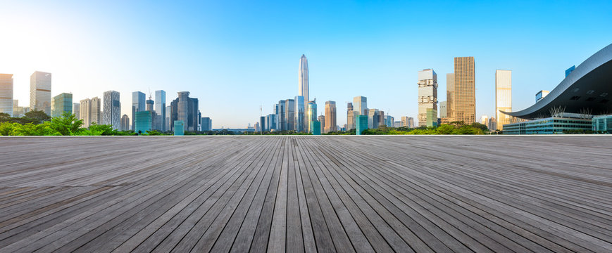 Wood floor square and modern city skyline panorama in Shenzhen,China