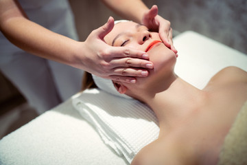 Obraz na płótnie Canvas Rejuvenating relaxing massage by masseur