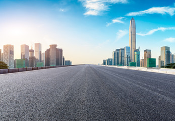 Fototapeta na wymiar Empty asphalt road and modern city skyline in Shenzhen,China