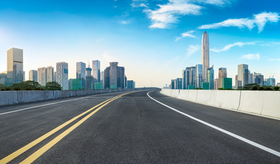 Fototapeta na wymiar Empty asphalt road and modern city skyline panorama in Shenzhen,China