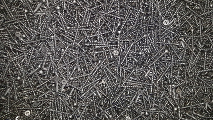 metal screw, iron screw, chrome screw, screws as a background