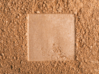 Powder and sponge texture.