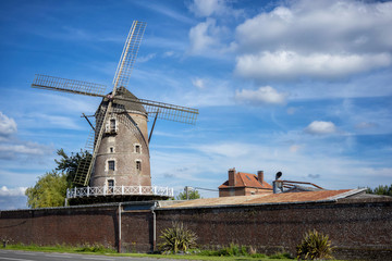 Fototapeta na wymiar Old windmill near Saint Omer. Pas de Calais. France.