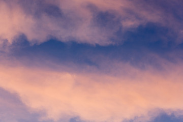 red clouds are highlighted by the setting sun, color gradient, abstract