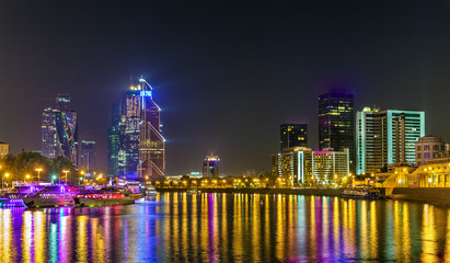 Obraz premium View of the Moscow International Business Centre above the Moskva River in the night