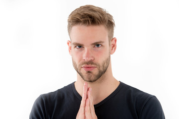 Bearded man pray isolated on white. Guy prayer hold hands clasped near unshaven face. Full concentration. Praying for something. Calm and handsome