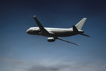 an airplane in the night sky