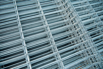 Brilliant polished metal wire mesh, folded into a flat leaf, poured into cold metallic shades.