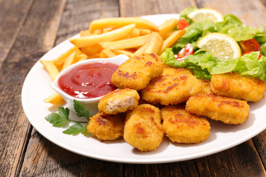 nugget, french fries and salad