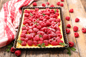 raspberry pie on wood background