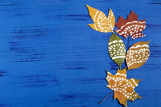 Hand-painted on dry autumn leaves