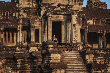 Tourist in the temple of Angkor Wat. Siem Reap, Cambodia.