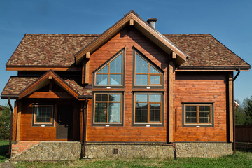 New Houses. Luxury Houses After Construction.Wooden Brick Houses. House Exterior. Life Concept
