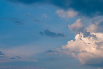Beautiful sky with clouds in early May and plance