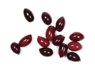 Black olives, pile isolated on white background, top view