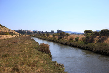 Waterway leading to Tomales Bay in Point Reyes National Seashore on a sunny day