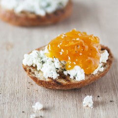 Top view of Healthy Sandwich toast with lettuce, ham, cheese and tomato on a wooden background
