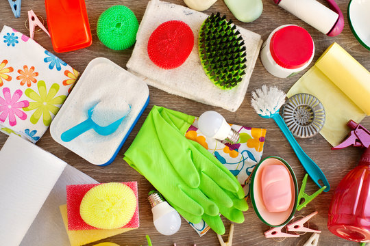 Household items in different forms. Washing powder, garbage bags, rubber gloves, soap, sponges, brushes for cleaning the house and washing clothes. House utensils for cleanliness.