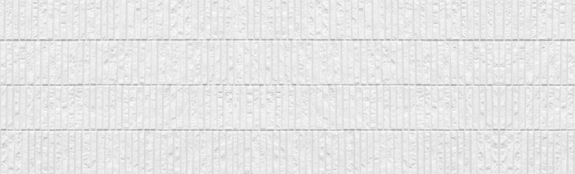 Panorama of Modern white stone tile wall background and pattern