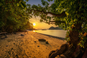Sunset over the beach of Ko Hong island in the Krabi province, Thailand