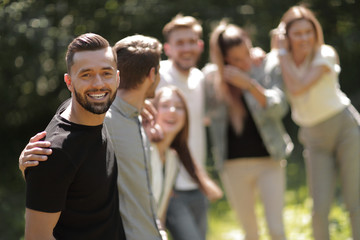 modern guy and his friends standing together