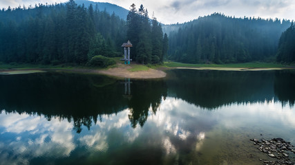Aerial view on heart of Ukrainian part of Carpathians Mountains - the lake Synevyr.