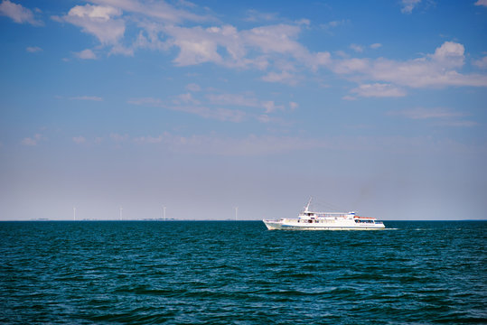 Fototapeta aerial top view yacht sailing in sea