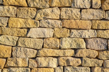 Background of stone wall pattern texture close up