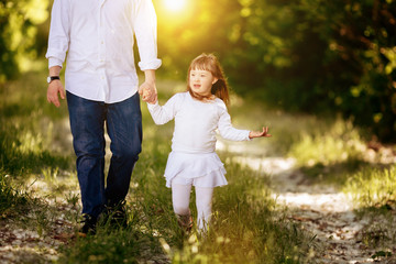 Fototapeta premium People with down sydrome walking in forest