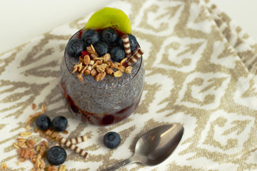 Chia pudding with coconut milk, blueberry and granola