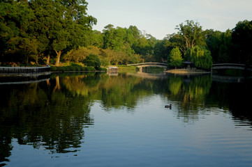 Fototapeta na wymiar The lake at Pullen Park in downtown Raleigh North Carolina in the early morning sunshine