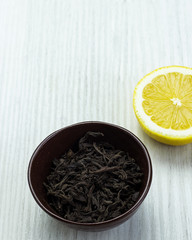 Heap of dry tea on white background