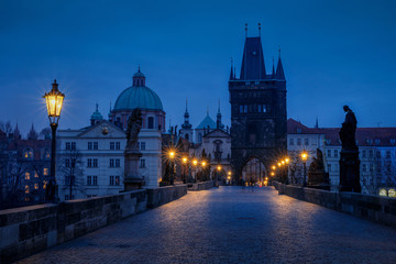 Fototapeta na wymiar The Old Town with Charles bridge in Prague early in the morning with light of city lamps