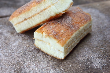 fresh sweet homemade delicious cake on wooden background