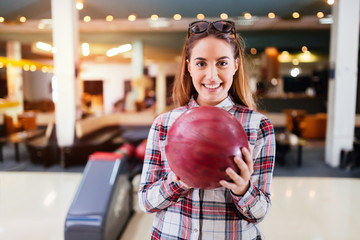 Fototapeta premium Beautiful woman bowling